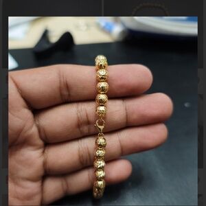 18 KARAT GOLD DIACUT BALL BRACELET 6.5 INCHES